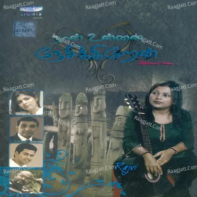 Naan Unnai Nesikkiraen Poster